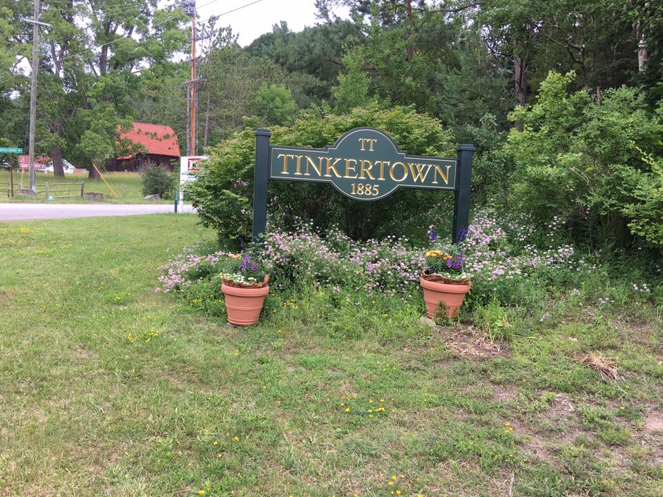 Tinkertown Sign before weeding and Mulching