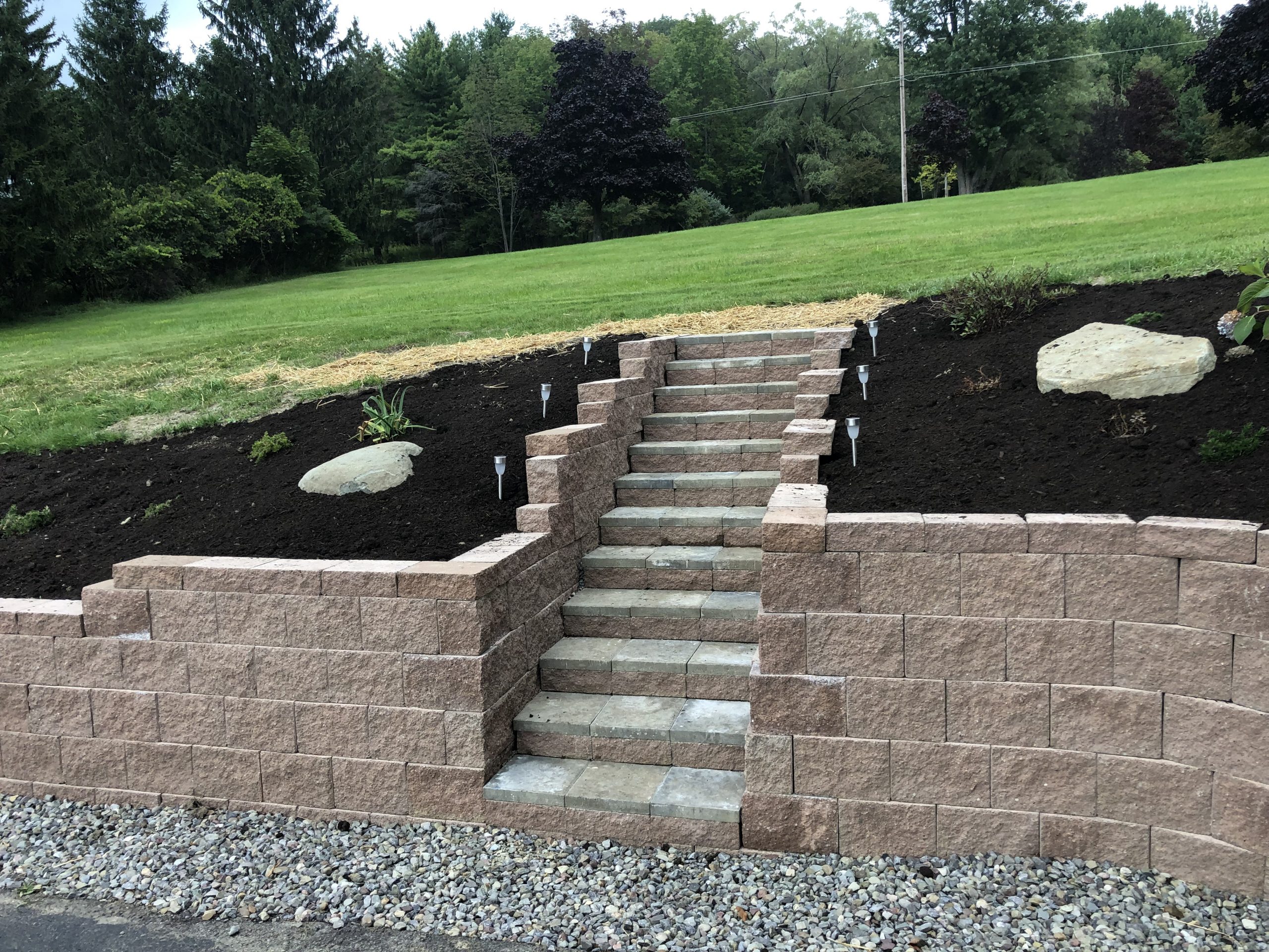 landscape retaining wall installation | Snow Hill Inc | Hornell, Wellsville, Alfred, Andover, & Belmont, NY